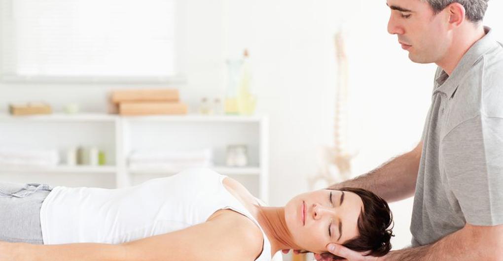 Chiro adjusting neck